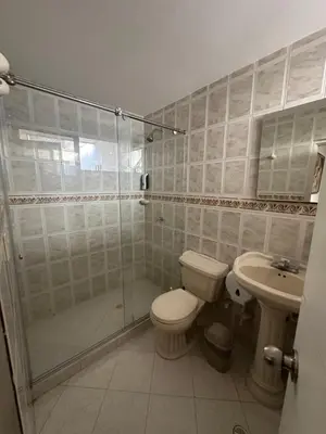 a bathroom with a shower and a toilet and a sink at APARTAMENTO in Cartagena de Indias