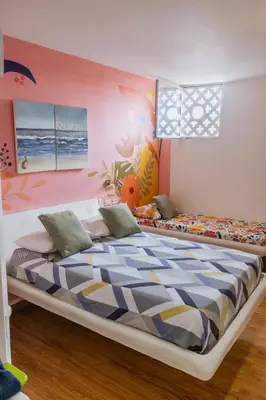 a bedroom with a large bed in a room at King's Apartments 302 in Cartagena de Indias