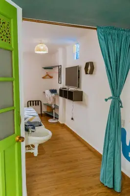 a hospital room with a bed and a sink at King's Apartments 302 in Cartagena de Indias