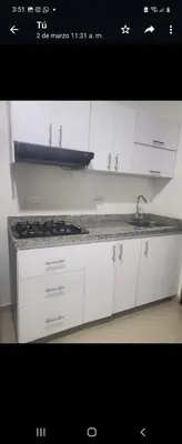 a kitchen with a sink and a counter top at Apartment by the sea in Puerto Colombia