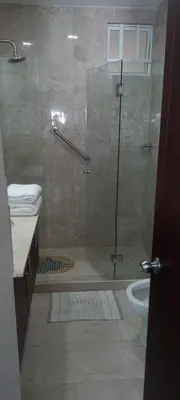 a bathroom with a shower and a toilet and a sink at APARTAMENTO MORROS922 LA BOQUILLA con acceso directo a la Playa in Cartagena de Indias