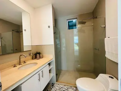 a bathroom with a shower and a toilet and a sink at MORROS EPIC 1111 in Cartagena de Indias