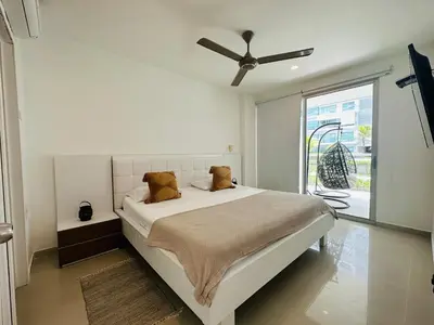 a bedroom with a bed with a ceiling fan at MORROS EPIC 1111 in Cartagena de Indias
