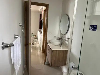 a bathroom with a sink and a mirror at Apartamento con vista al mar in Cartagena de Indias