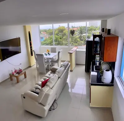 a living room with a couch and a table at Apartamento 401 in Cartagena de Indias