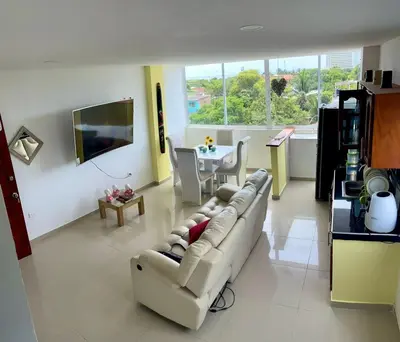 a living room with a couch and a table at Apartamento 401 in Cartagena de Indias