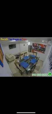 a room with a table and chairs in it at Apartamento 303 in Cartagena de Indias