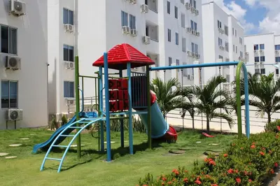 a playground in front of a large building at Coveñas Apartamento vacacional caribe campestre 9-502 in Coveñas