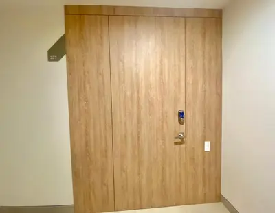 a large wooden door in a room at Espectacular frente al Mar- Morros Zoe - Playa Manzanillo Cartagena in Cartagena de Indias