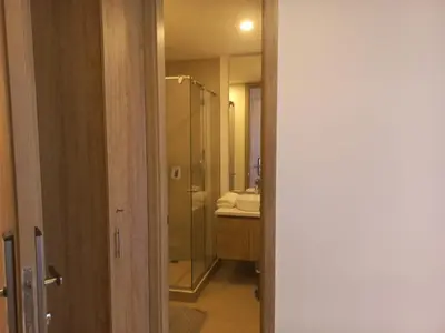 a bathroom with a glass shower and a sink at Apto morroszoe 217A in Cartagena de Indias