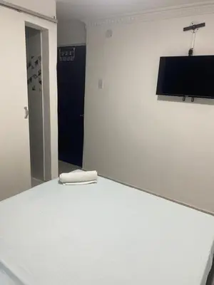 a room with a bed with a towel on it at Habitación cerca al aeropuerto 3 in Cartagena de Indias