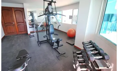 a room with a gym with chairs in it at Torres del lago de 2 habitaciones, 1201 in Cartagena de Indias