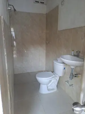 a bathroom with a toilet and a sink at Mar Rosa Galerazamba Hostal in Galerazamba