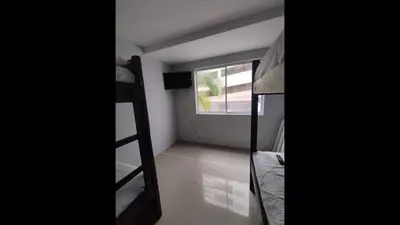 a room with a bunk bed and a window at Bm-15 room near the sea with air conditioning and WIFI in Cartagena de Indias