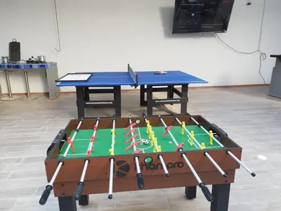 a ping pong table with a ping pong ball at Bm-6 room near the sea with air conditioning and WIFI in Cartagena de Indias